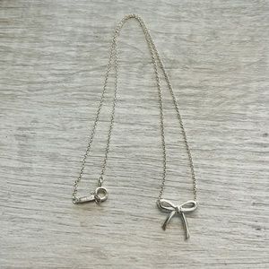 Tiffany & Co. Retired Ribbon/Bow Necklace in Sterling Silver.